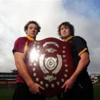 Rival captains Matt Clutterbuck (left, Alhambra-Union) and Scott McKee (Dunedin) hold the Speight...