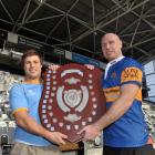 Rival captains Sam Sturgess (University A, left) and Charlie O'Connell (Taieri) hold the Speight...
