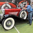 Robert Duncan, of Wanaka, gives his 1934 Duesenberg Le Baron-bodied Sports Phaeton a polish after...