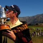 Robert Gates, of the United States, kisses the Brodie Breeze Challenge Cup after winning the...