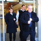 Roger Weatherston (front) is followed out of the High Court at Christchurch by daughter Angela...
