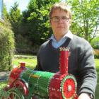 Roman Johnston,  from Weston, shows off one of the Meccano creations that will be on display in...