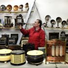 Ronald A Proctor Auctioneers manager Ricky Proctor examines a Welshbach Kern heater, part of the...