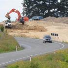 Rooney Earthmoving contractors work on a $1.14 million project to straighten corners on State...