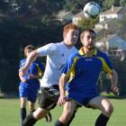 Rory Hibbs (Melchester Sharks, front) and Fraser Cameron (Roslyn-Wakari) compete for the ball...