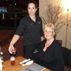 Rosebank Lodge restaurant and function supervisor Monique Rutene pours a drink before Rosebank...