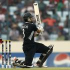 Ross Taylor watches a ball he hit go for six during the Cricket World Cup quarterfinal between...