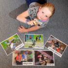 Rotary Park School pupil Katie Gotlieb (10) with her award-winning photos. Photo by Craig Baxter.