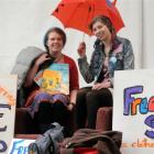 Rowan McArthur (left) and Feather Shaw with some of the items which will be given away at their...