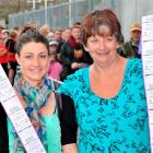 Royal fans Tash Bambry and her mother, Marion Long, both of Dunedin, show off the tickets they...