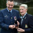 Royal New Zealand Air Force liaison officer and former squadron leader Andrew Rooney (left)...