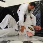Royler Gracie throws Ryan Henry on the floor at Dunedin Fight and Fitness Academy yesterday....