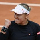 Russia's Nadia Petrova reacts as she defeats Venus Williams. (AP Photo/Michel Spingler)