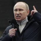 Russian Prime Minister Vladimir Putin speaks at a rally in his support at Luzhniki stadium in...