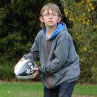 Ryan Box (12), of Dunedin, plays Rippa rugby at the Operation New Direction sports club  launch...