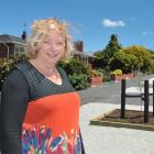 Saddle Hill Community Board deputy chairwoman Pam Jemmett admires the new landscaping in November...