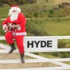 Santa, aka Mark O'Neill, pictured right, will hit Hyde tomorrow, along with a band of his musical...