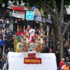 Santa Claus makes an early visit to Dunedin for yesterday's Santa Parade. Photo by Christine O...