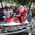 Santa, with a jet ski for a sleigh, at the Oamaru Santa Parade on Saturday. Photo by Ben Guild.