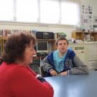Sara Cohen School Principal Raewyn Alexander (left) and pupil Jordan Gilmour (14) talk in one of...