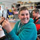 Sara Cohen School pupil Joshua Anderson (18) acquaints himself with a new iPad mini, one of five...