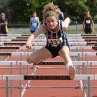 Sarah Langsbury, of St Hilda’s Collegiate School, wins the girls’ under-14 80m hurdles at the...