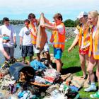 Scarfie Army coastal clean-up crew (from left) Samantha Panko (19), Conor Whitehead (20), James O...