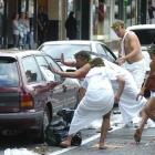 Scenes from Tuesday's toga parade which spiralled out of control. ODT files
