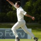 Otago left-armer Bradley Scott celebrates taking the wicket of Wellington batsman Michae Parlane...