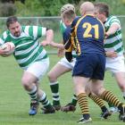 Scott Guthrie takes the ball up at a rugby match held yesterday at Watson Park in Port Chalmers...