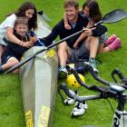 Scott Wilson, with the support of his children (from left) Finn (7), Sophie (12) and Jemma (9),...