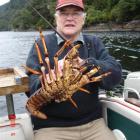 Scuba-diving enthusiast Graham Sharp with the one that didn’t get away. Photo supplied