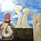 Sculptor Gavin Wilson with some of his exhibition pieces yesterday.
