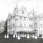 Seacliff Lunatic Asylum nursing staff pose on the lawn in front of the building, c 1890, in this...