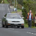 Sean Hogan and Korena Paterson guide children (from left) Hannah Hogan (7) and sisters Andie (8)...