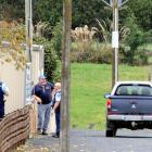 Police search Toko Golf Club for escaped prisoner Stephen Uriah Maddren yesterday. Photo by Craig...