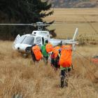Searchers head for the Ahuriri Valley during last month's efforts to find a missing tramper....