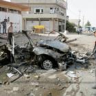 Security personnel inspect the site of a car bomb attack in Kirkuk, 250km north of Baghdad....