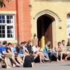 Selwyn College students enjoy the sunshine in their quad.  Photo by Peter McIintosh.
