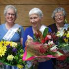 Senior Blossom Festival Queen Jennifer Bowie, of Alexandra (centre), is flanked by the two...