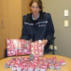 Senior Constable Beth Fookes displays the  Kush Pink seized by police. Photo by Christina McDonald.