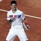 Serbia's Novak Djokovic reacts after winning a point against Spain's Rafael Nadal during the...