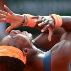 Serena Williams celebrates defeating Maria Sharapova to win the French Open at the Roland Garros...