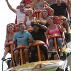 Serena Williams, front row right, takes a ride on the Diamondback roller coaster at Kings Island...