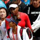 Serena Williams of the US leaves after training on a practice court at the Wimbledon Tennis...