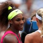 Serena Williams of the US talks to Andrea Hlavackova of the Czech Republic after their women's...