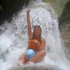 Serious Fun River Surfing guide Anna Moresby poses for the Christchurch earthquake calendar...