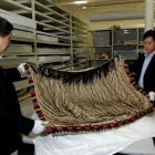 Shanghai Museum vice-directors Prof Chen Kelun (left) and Prof Li Zhongmou examine a Maori...
