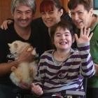 Shania Hutton back home with Felix the cat and her family, (from left) father Andrew, mother Jane...