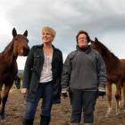 Sharyn Anderton (left) and Karen Stewart out on the farm at White Robe Lodge.